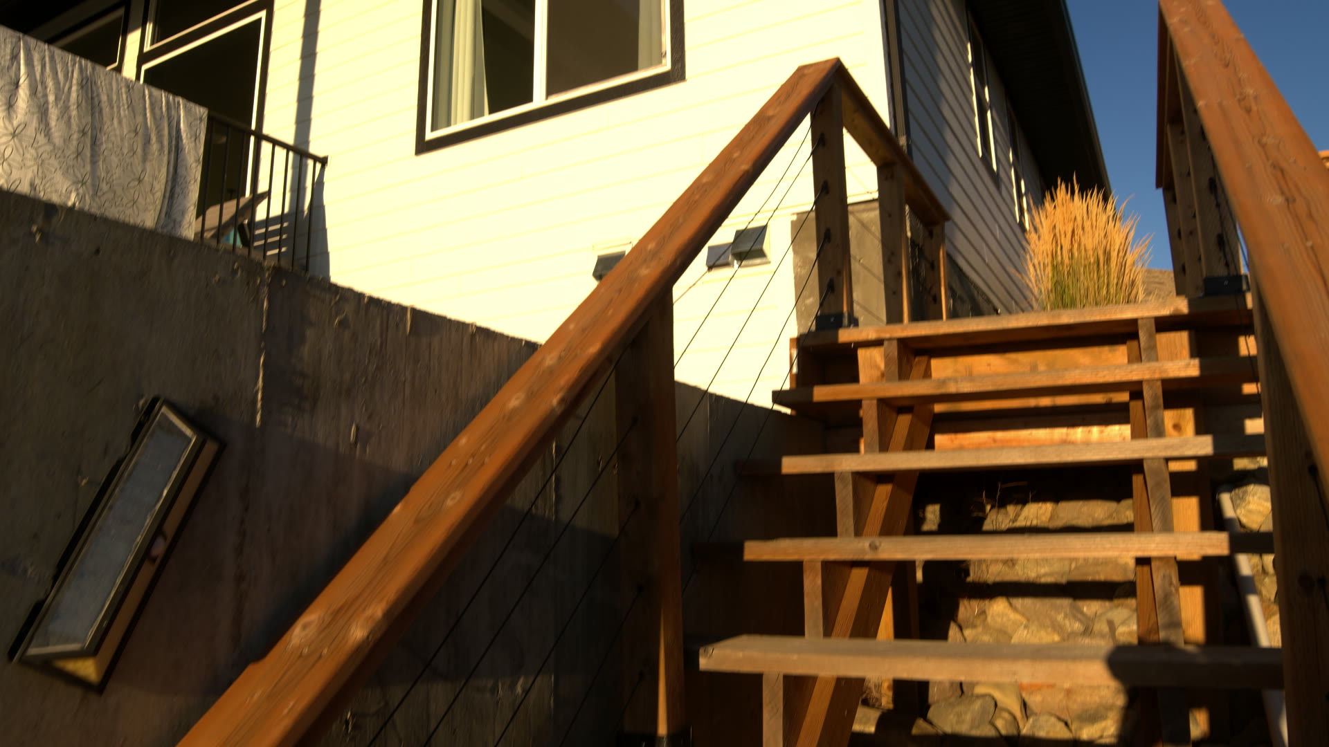 The deck stairs in the evening sun