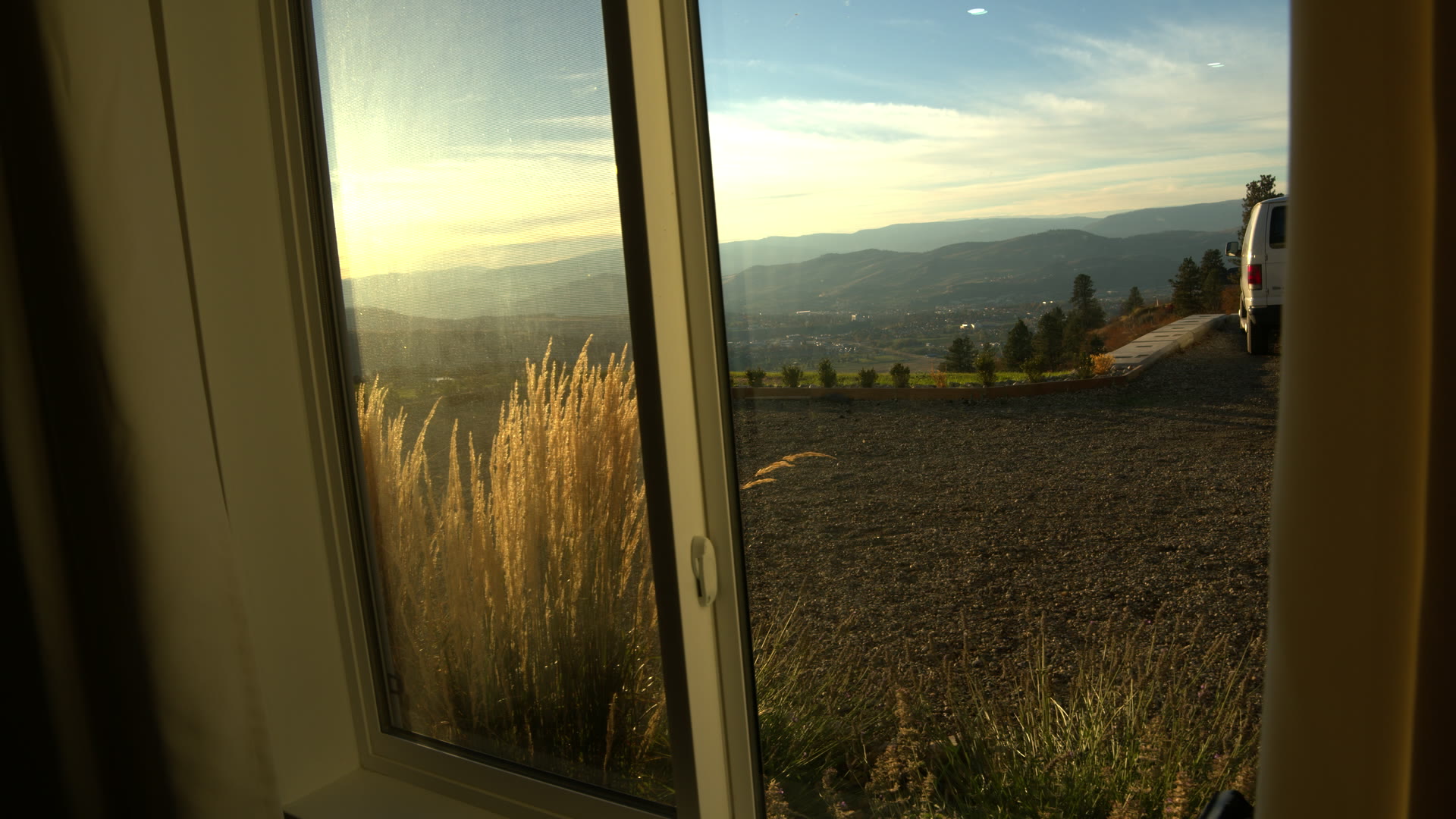 The view from the window: grasses, the valley, the hills